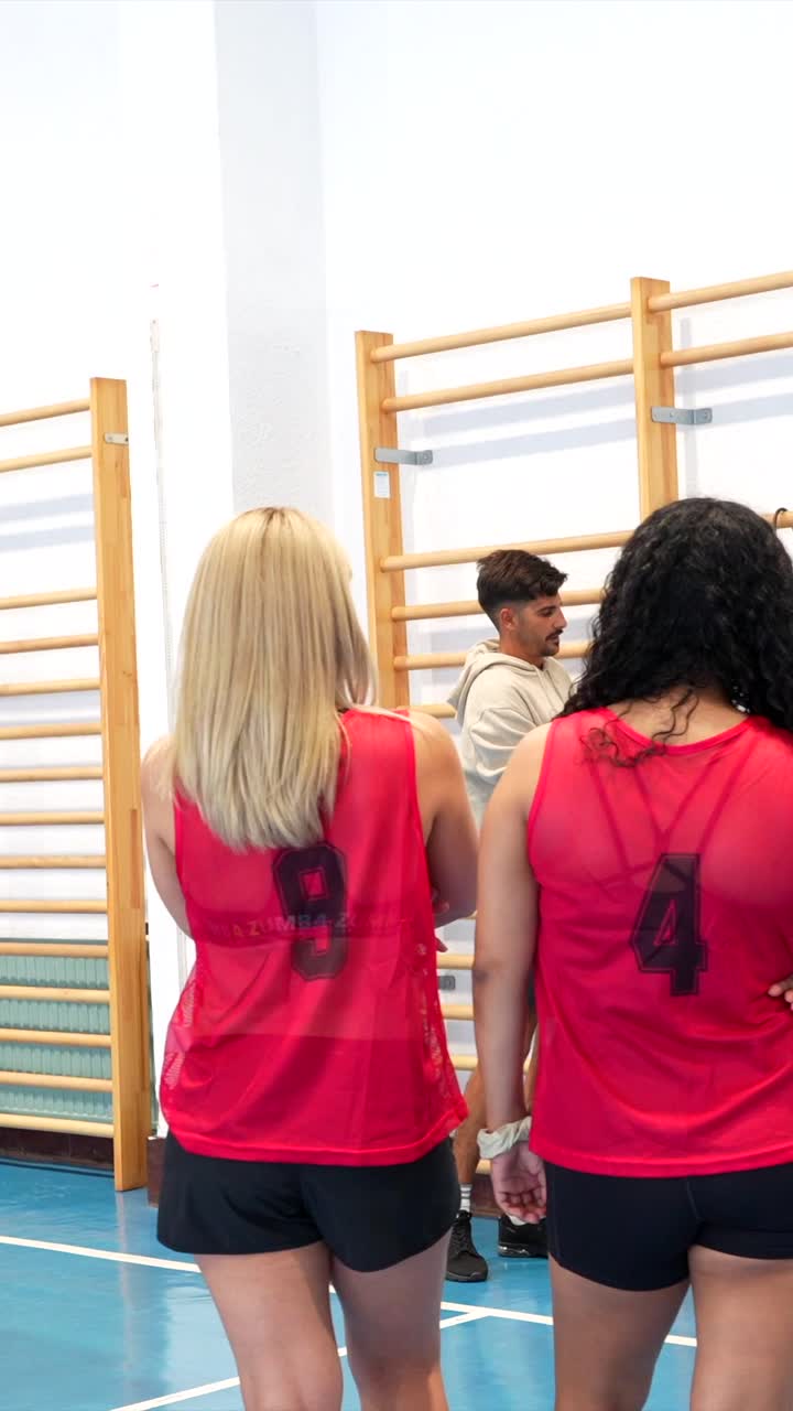 People in Gym with Wall Bars