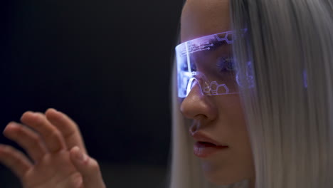 closeup vr goggles woman analyzing innovation cyberspace. girl in virtual world