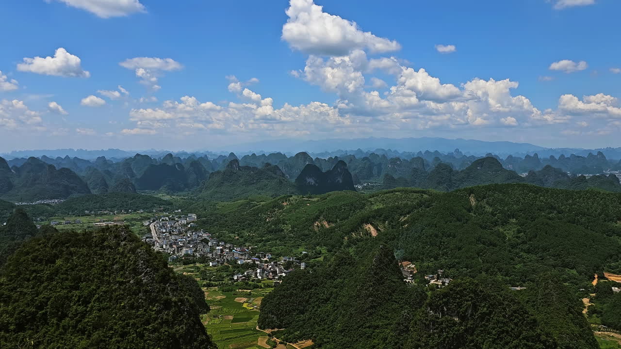 Panoramic view of karst mountains and the countryside of Yangshuo, China, summer