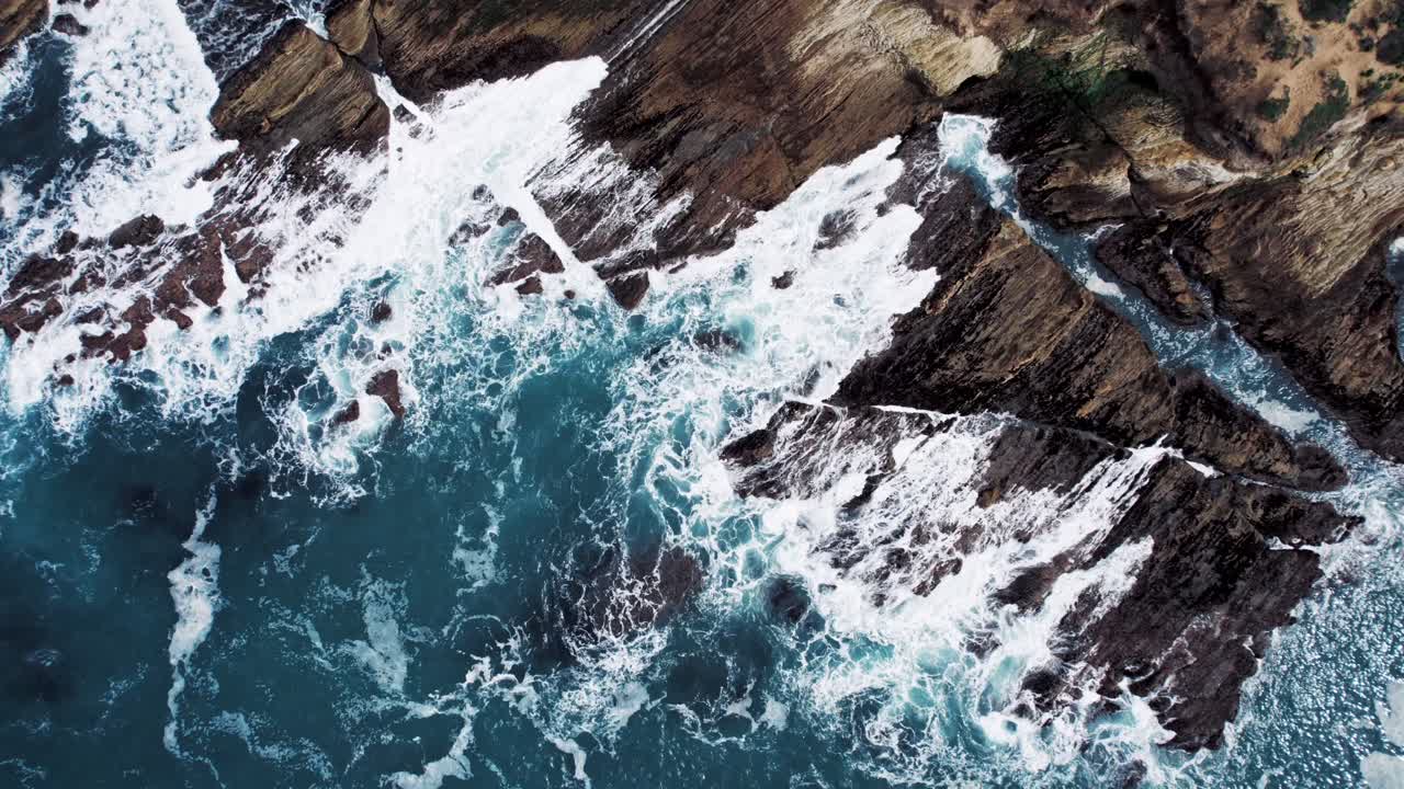 Dramatic Ocean Cliffs on the West Coast with Waves Crashing Against Rocks