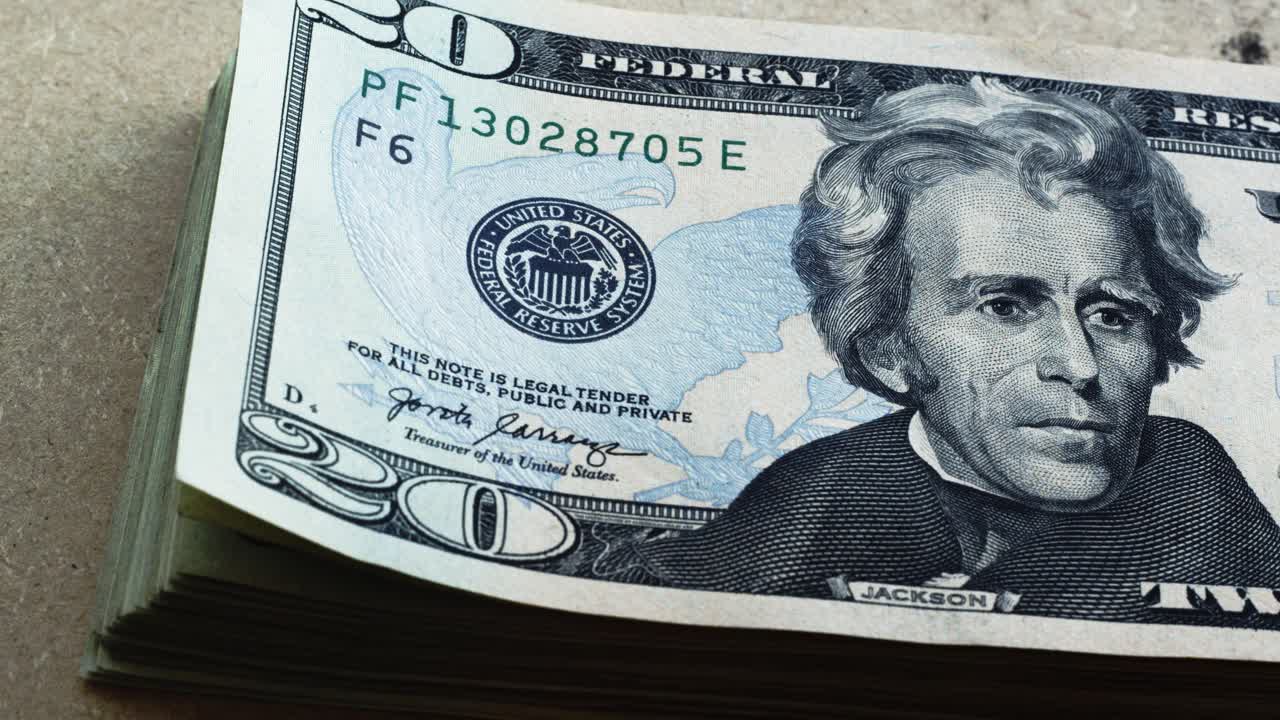 andrew jackson en billetes de 20 dólares usds volteando en marco 4k