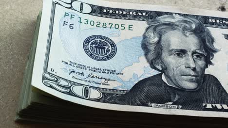 andrew jackson in 20 dollar bills usds flipping into frame 4k