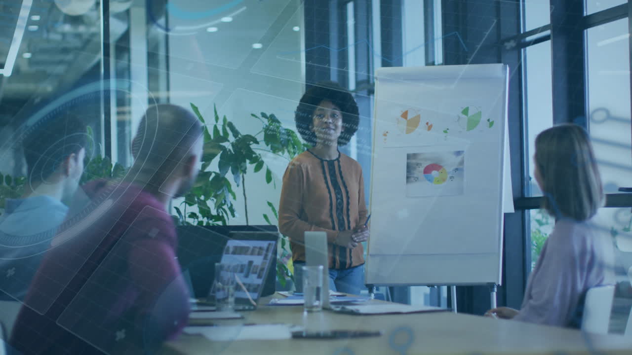 Presenting data on flip chart, businesswoman using animation in modern office