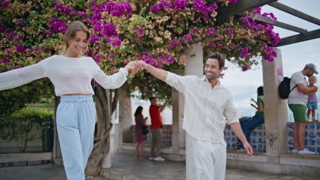 dating pair strolling greenery city date. love man woman holding hands at park