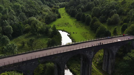 Aerial-view-over-an-old-railway-viaduct-at-Monsal-Head,-Peak-District,-Derbyshire,-England