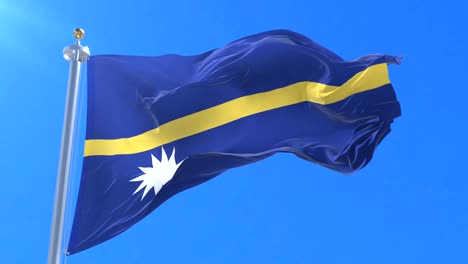 nauru flag waving at wind in slow in blue sky, loop