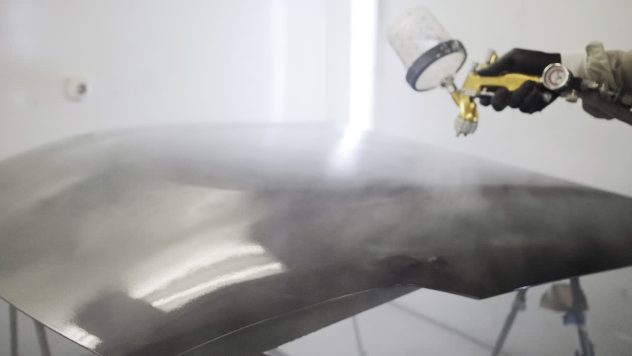 진행 중인 자동차 페인트 작업