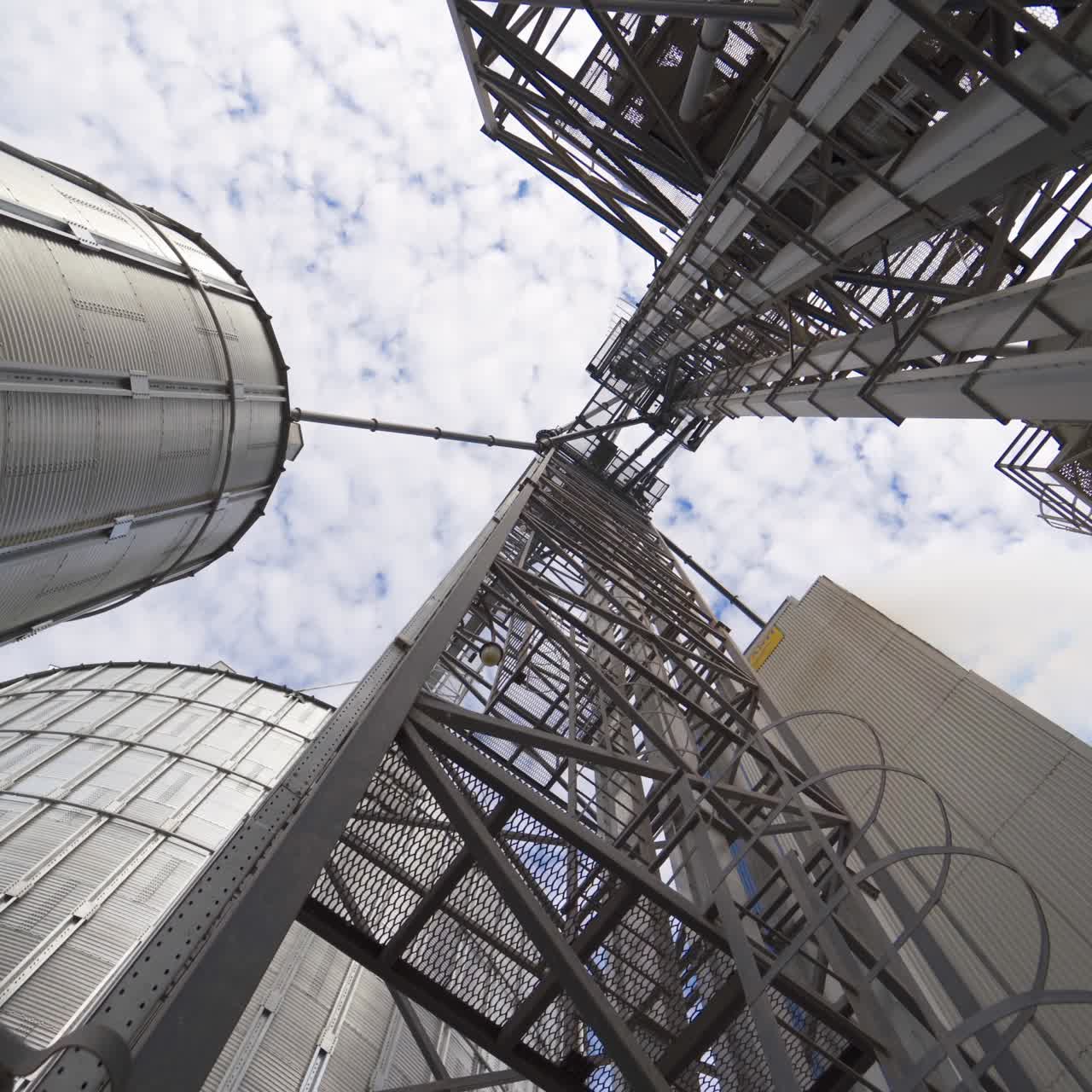 Grain processing facility. Industrial Factory silos for food production