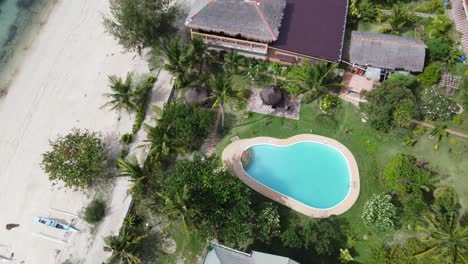 Cocobana-beach-resort-patio-on-Malapascua-tropical-island-with-blue-outdoor-swimming-pool