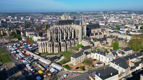 historic city of le mans, with cathedrale saint-julien and surrounding urban area, sarthe, france. aerial backward