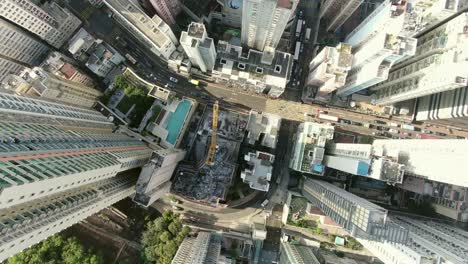 downtown hong kong city skyscrapers and urban traffic, aerial view