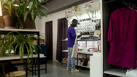 young man entering a store