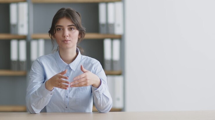Business woman giving presentation in office setting
