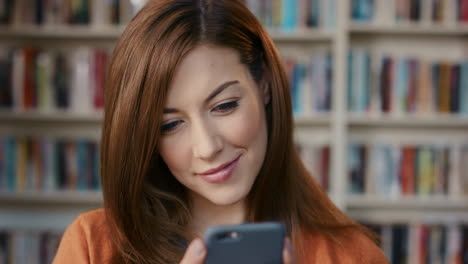 Happy-Beautiful-woman-using-smart-phone-at-home