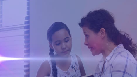 animation of light trails over biracial woman and her daughter reading books