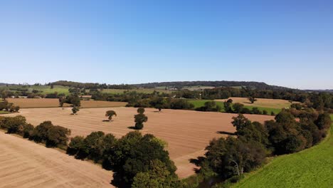 Aufsteigende-Luftaufnahme-Mit-Blick-Auf-Die-Landschaft-Von-East-Devon-In-Der-Nähe-Von-Honiton-Devon