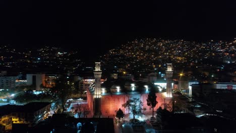 aerial night view of bursa city landscape and grand mosque. 4k footage in turkey