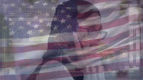 animación de procesamiento de datos y agitando nuestra bandera sobre mujer biracial en hijab hablando en teléfono inteligente