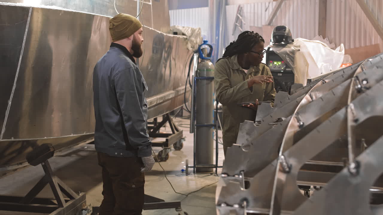 Shipbuilding and Metal Fabrication in an Industrial Workshop