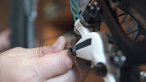 repair of hydraulic brake pads in a bicycle.