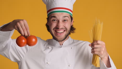 caucasian man in front of camera on yellow background.