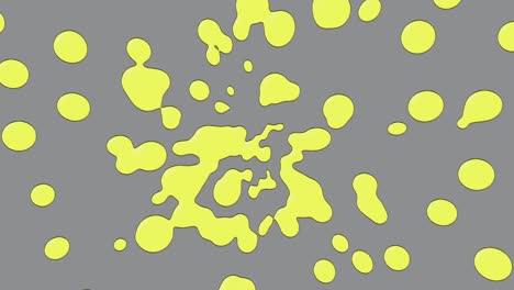 yellow ink abstract splashes on gray background