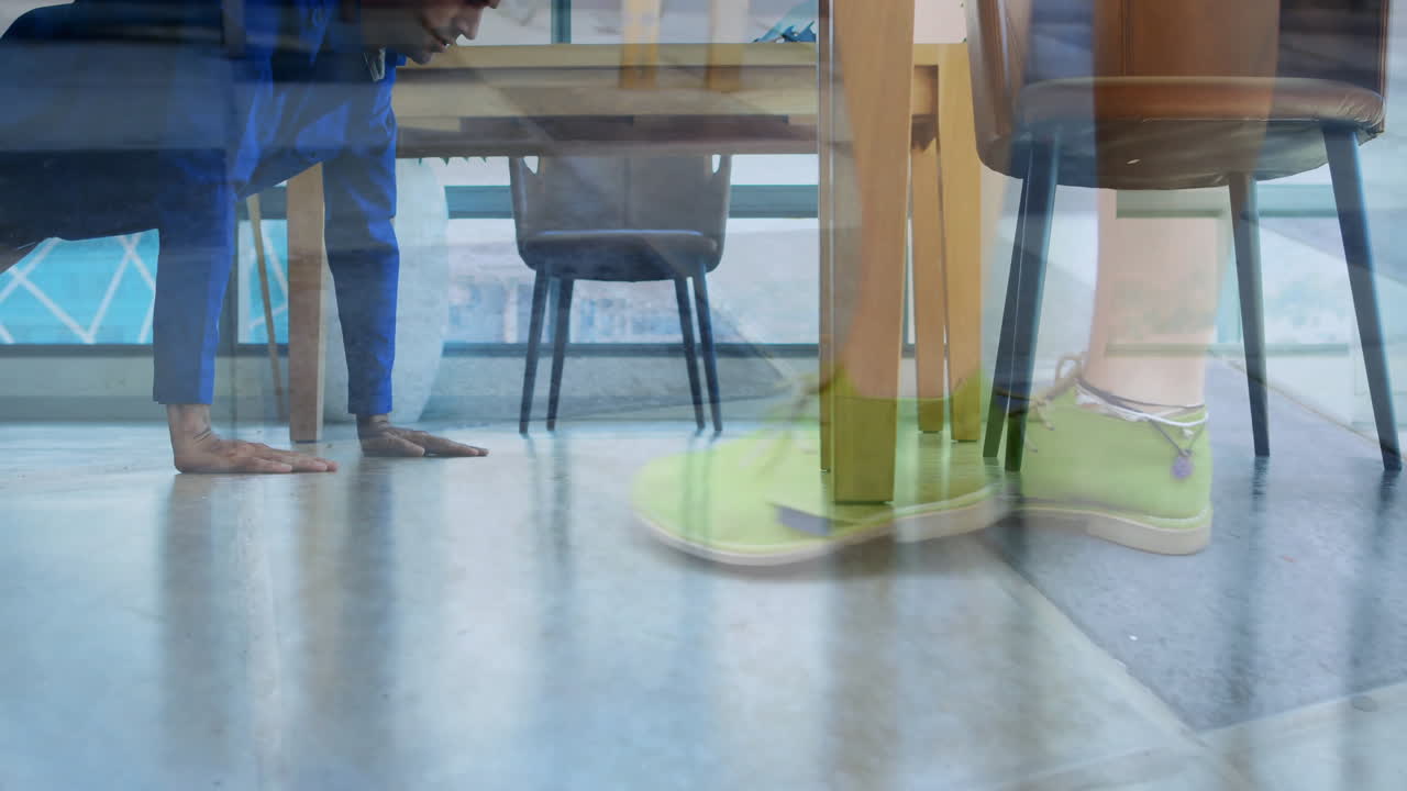 Person doing push-ups in office with overlay of walking feet animation