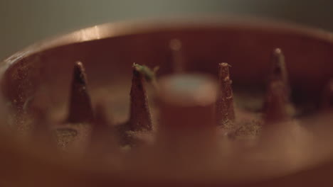 extreme macro close up of a marijuana grinder