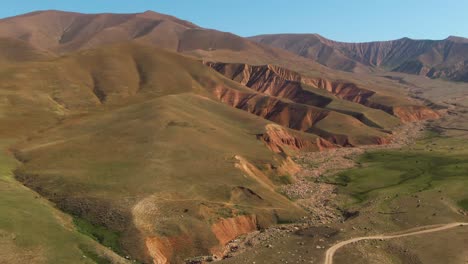 Beautiful-green-Arashan-Mountains-and-hills-in-Kyrgyzstan--Aerial