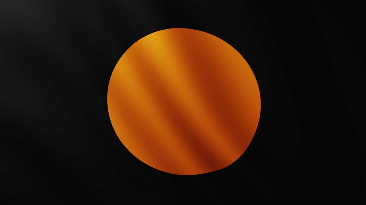 bandera negra grande con círculo naranja de fondo en pantalla completa revoloteando en el viento