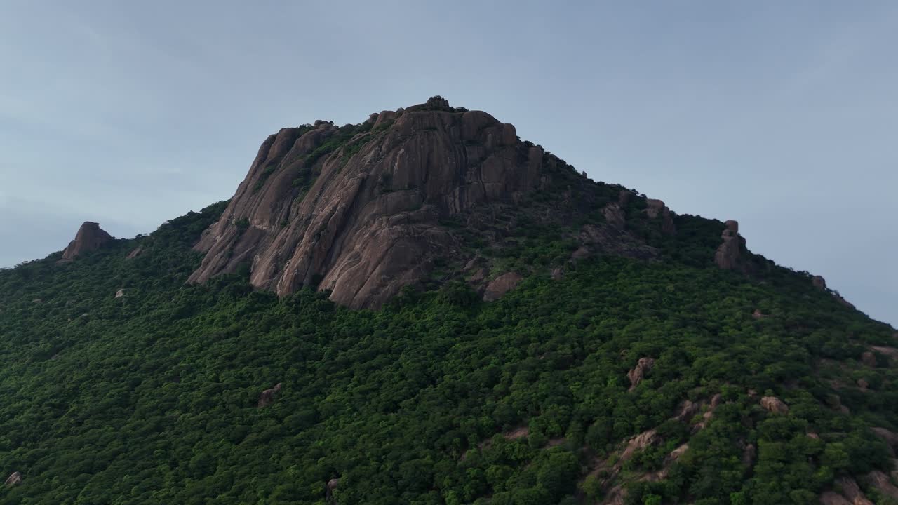Aerial Drone Shot of Mountain Top Covered with Greens