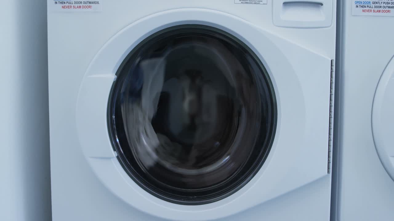 Washing machine washing clothes 4k