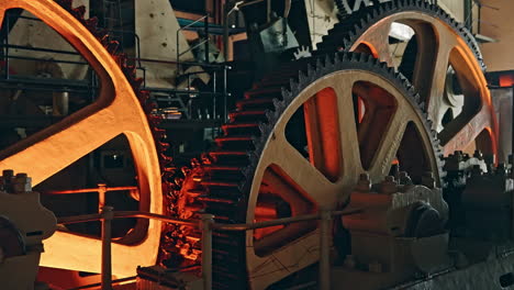 big industrial group of gears working in the machinery