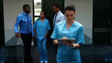 female doctor using digital tablet in hospital