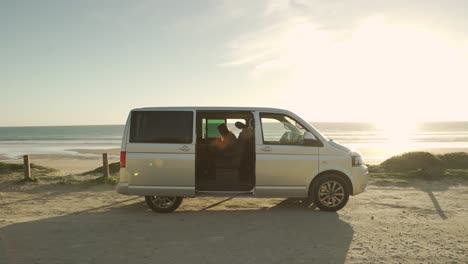 Traveling-woman-working-on-laptop-in-van