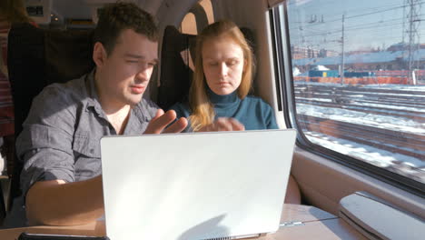 young people on business travel with laptop