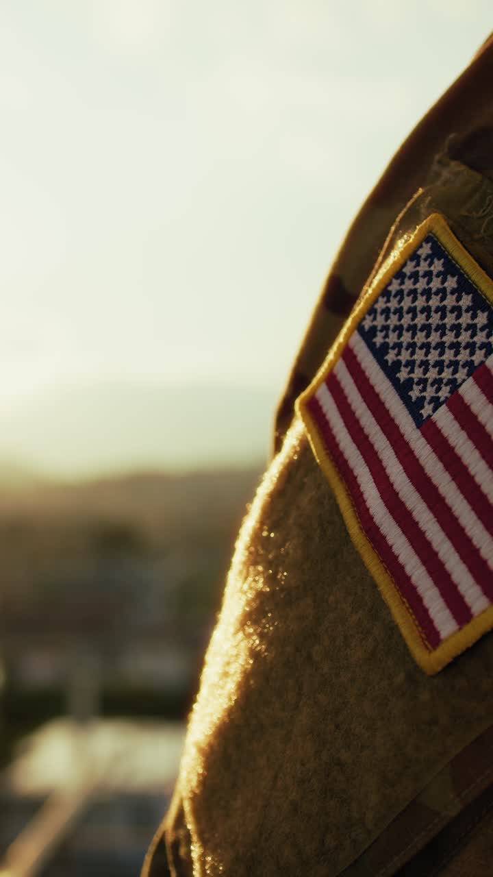 Soldier In Front Of American Flag At Sunset During Memorial Day