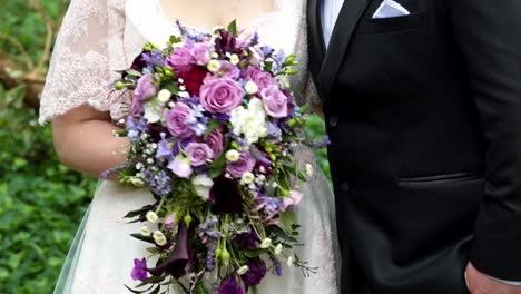 shot of bride - groom with wedding flower