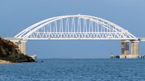 white arch bridge over water