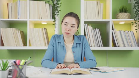 Pensive-Asian-young-female-student.