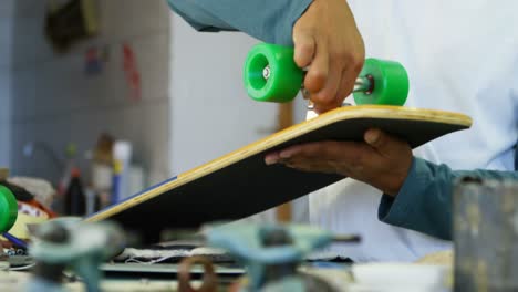 man making skateboard 4k