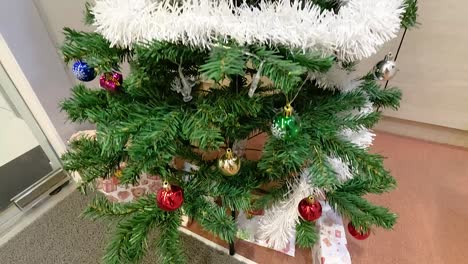 christmas tree decorated with ornaments and tinsel