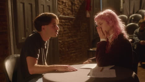 emotional couple having dramatic dialogue on theater stage