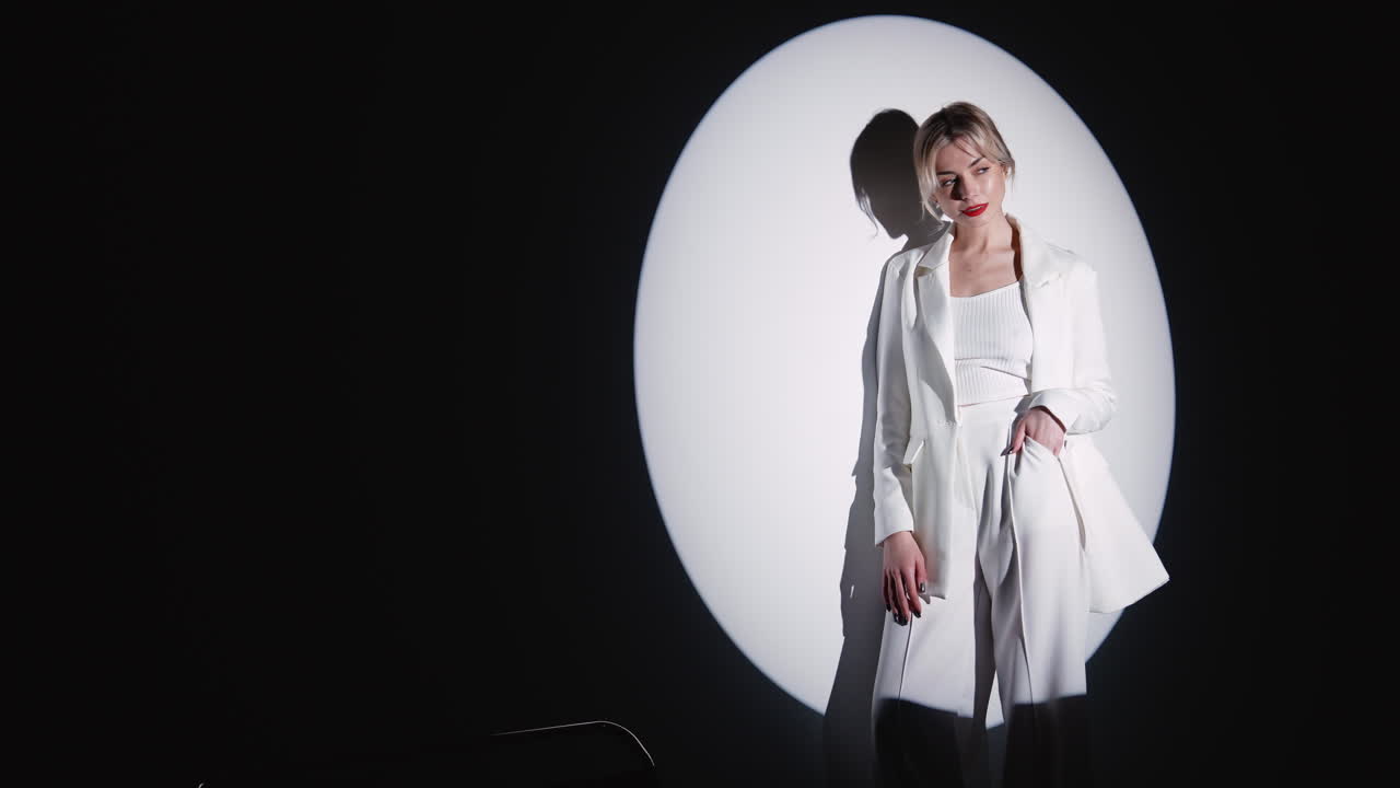 Woman in White Business Suit