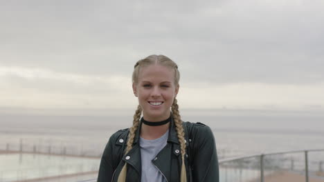 portrait of tough looking blonde woman laughing cheerful