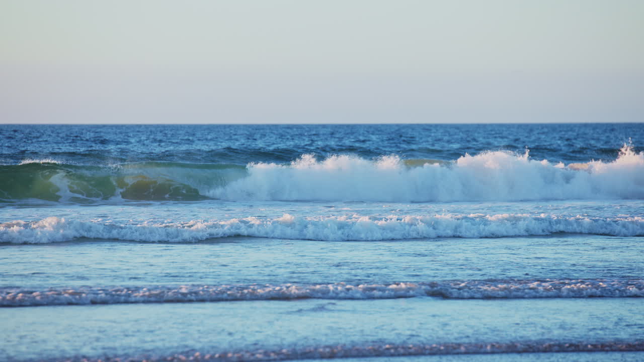 Vibrant Santa Cruz sunset with stunning ocean views, golden skies, and rolling waves—ideal for cinematic scenes, travel videos, or peaceful nature backgrounds.