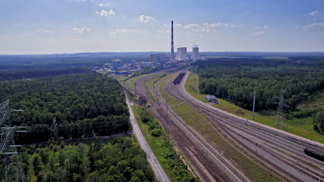 Aerial-over-train-tracks-leading-to-Jaworzno-power-station,-Poland