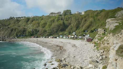 4K-Panoramic-landscape-shot-of-the-beach-of-Church-Ope-on-the-island-of-Portland,-in-Dorset,-England,-on-a-beautiful-sunny-day