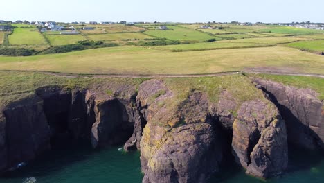 big cliffs in ireland seeing from the middle of the sea