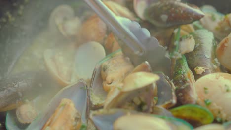 cooking fresh seafood in a pan